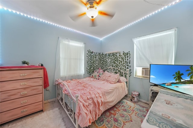 2321 Dallas St, Port Charlotte, FL 33952 - bedroom featuring cooling unit, a ceiling fan, light tile patterned flooring, and lofted ceiling