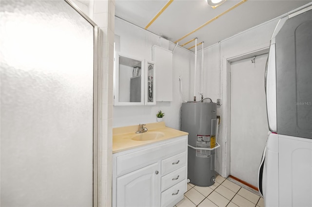 2321 Dallas St, Port Charlotte, FL 33952 - full bath with vanity, tile patterned floors, water heater, and stacked washer and clothes dryer
