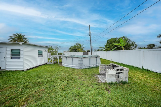 2321 Dallas St, Port Charlotte, FL 33952 - view of yard with fence and a fenced in pool