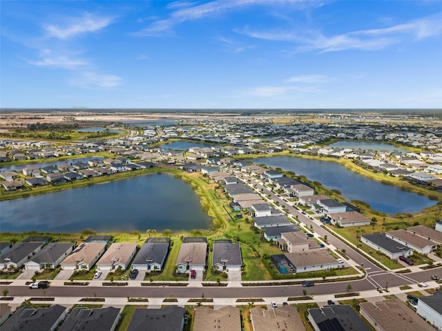 aerial view with a water view and a residential view