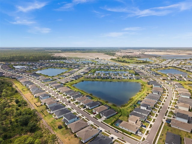 aerial view with a water view and a residential view