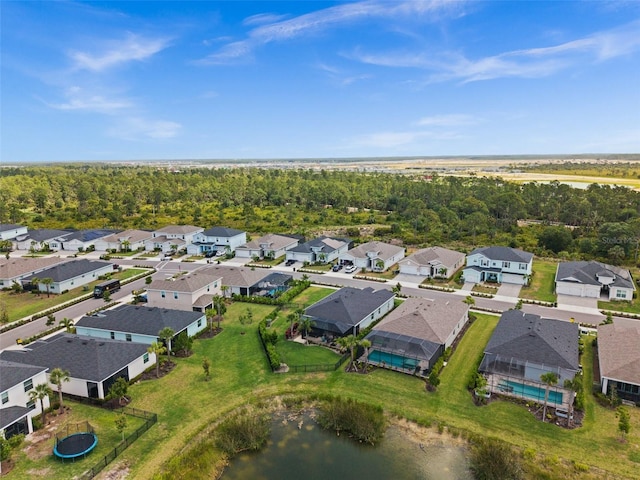 aerial view featuring a water view and a residential view