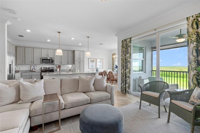 14061 Heritage Landing Blvd Unit 445, Punta Gorda, FL 33955 - living room featuring recessed lighting, ceiling fan, visible vents, and ornamental molding