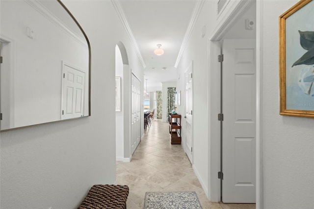 14061 Heritage Landing Blvd Unit 445, Punta Gorda, FL 33955 - corridor featuring crown molding, baseboards, and light tile patterned flooring