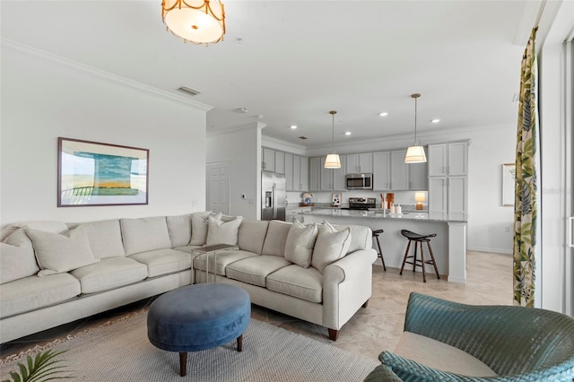 14061 Heritage Landing Blvd Unit 445, Punta Gorda, FL 33955 - living room featuring crown molding, recessed lighting, and visible vents