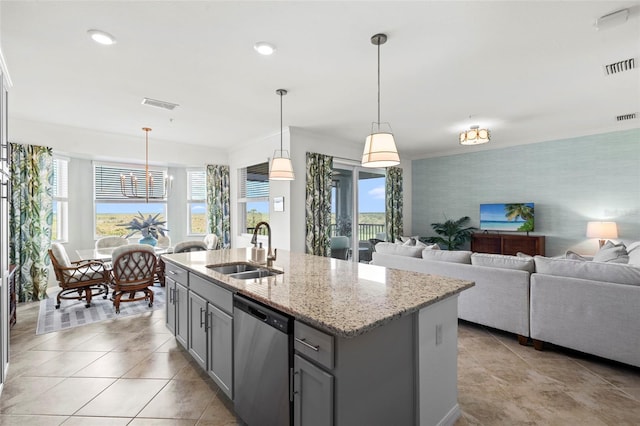 14061 Heritage Landing Blvd Unit 445, Punta Gorda, FL 33955 - kitchen with stainless steel dishwasher, a sink, gray cabinets, and visible vents