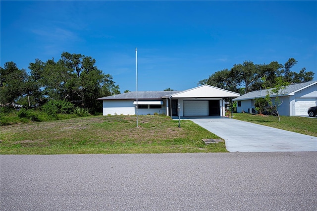 2113 Barksdale St, Port Charlotte, FL 33948 - single story home with a garage, a front yard, and concrete driveway