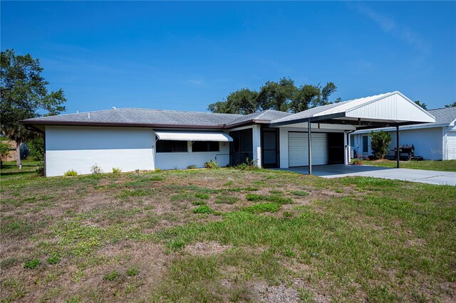 2113 Barksdale St, Port Charlotte, FL 33948 - ranch-style home featuring a garage, a front yard, concrete driveway, and stucco siding