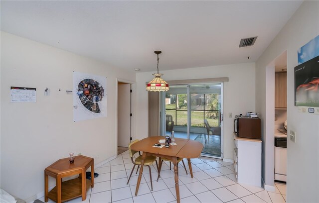 2113 Barksdale St, Port Charlotte, FL 33948 - dining space with baseboards