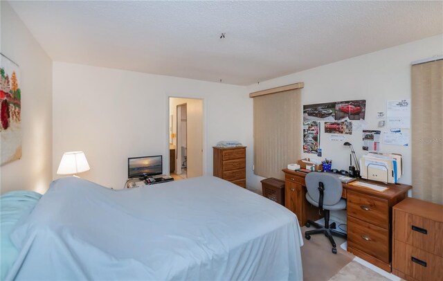 2113 Barksdale St, Port Charlotte, FL 33948 - bedroom with an office area and light colored carpet