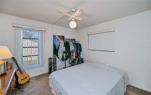 2113 Barksdale St, Port Charlotte, FL 33948 - bedroom featuring carpet flooring, baseboards, and ceiling fan