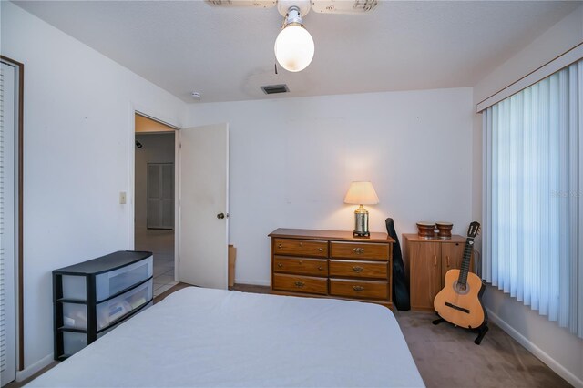 2113 Barksdale St, Port Charlotte, FL 33948 - bedroom with baseboards and carpet floors