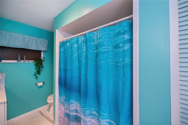 2113 Barksdale St, Port Charlotte, FL 33948 - bathroom with toilet and baseboards