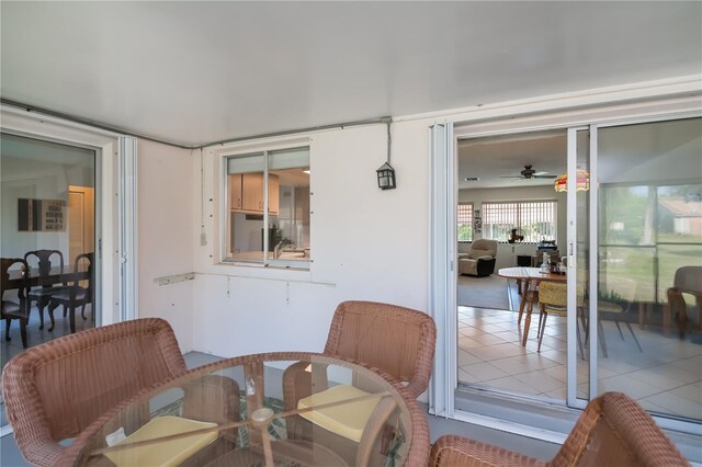2113 Barksdale St, Port Charlotte, FL 33948 - dining area with a ceiling fan and tile patterned flooring