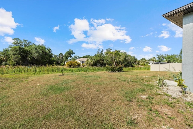 view of yard featuring fence