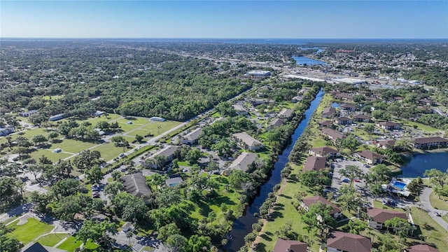 aerial view featuring a residential view and a water view