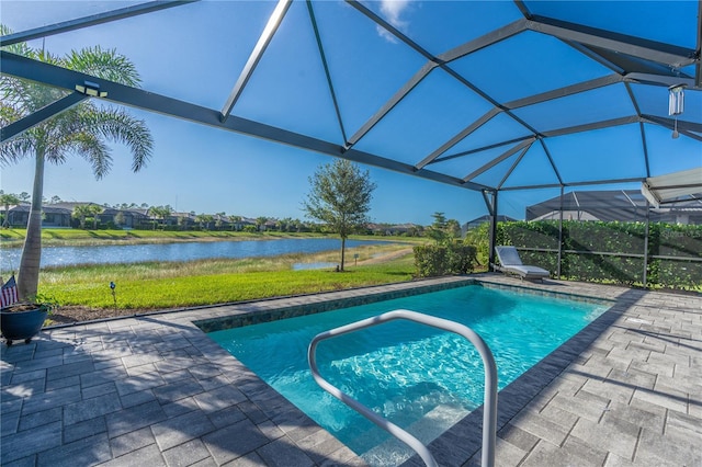 6763 Winding Cypress Dr, Naples, FL 34114 - pool with glass enclosure, a water view, and a patio area
