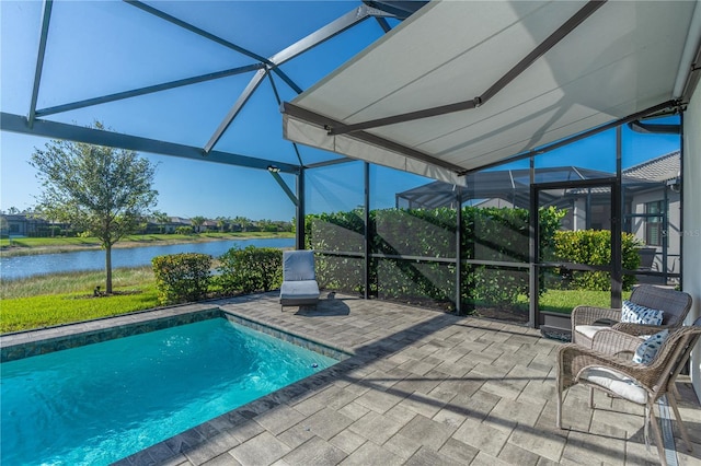 6763 Winding Cypress Dr, Naples, FL 34114 - outdoor pool with a water view, a patio area, and a lanai