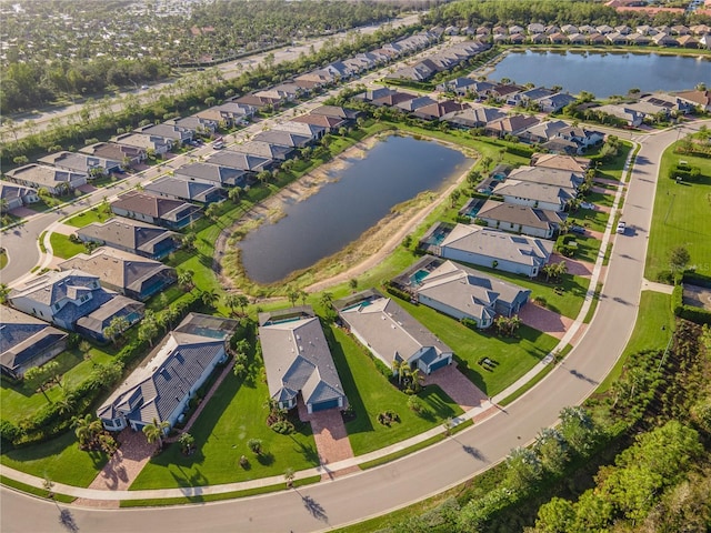 6763 Winding Cypress Dr, Naples, FL 34114 - aerial view featuring a water view and a residential view
