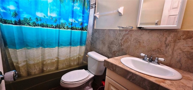 570 Mimosa Ave NW, Port Charlotte, FL 33952 - bathroom with vanity, toilet, shower / tub combo with curtain, tile walls, and backsplash