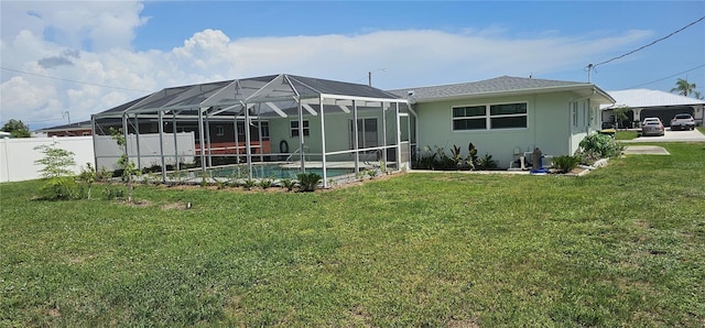 570 Mimosa Ave NW, Port Charlotte, FL 33952 - back of house featuring stucco siding and a lanai