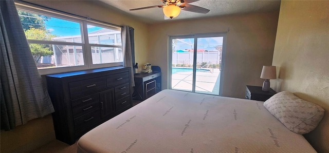 570 Mimosa Ave NW, Port Charlotte, FL 33952 - bedroom with access to outside and ceiling fan