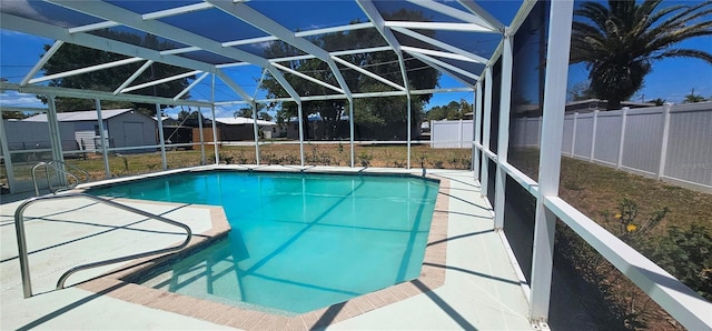 570 Mimosa Ave NW, Port Charlotte, FL 33952 - view of pool with a fenced backyard, glass enclosure, and a patio area