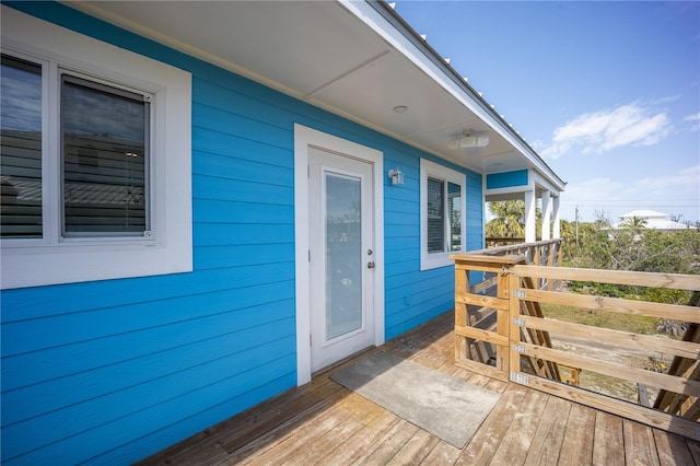 doorway to property with a wooden deck