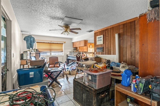 storage room with ceiling fan and visible vents
