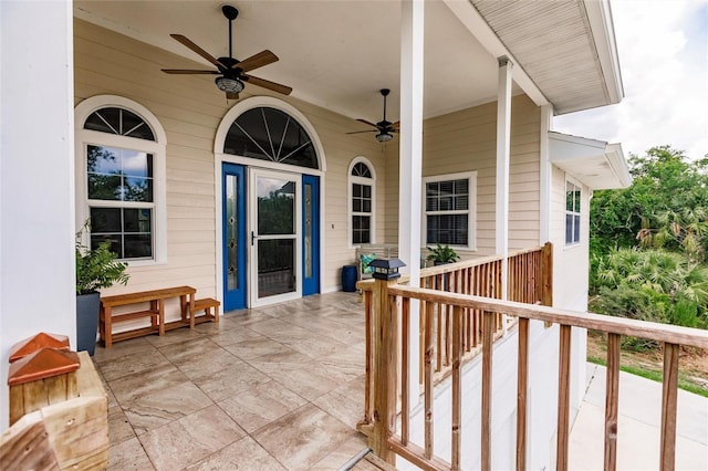 entrance to property featuring ceiling fan