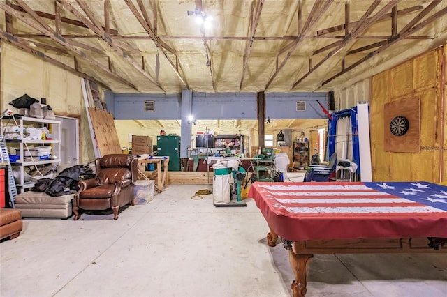 interior space featuring pool table, visible vents, and unfinished concrete flooring