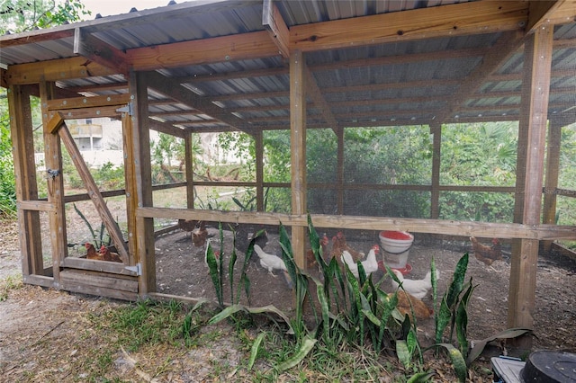 exterior space featuring exterior structure and an outdoor structure