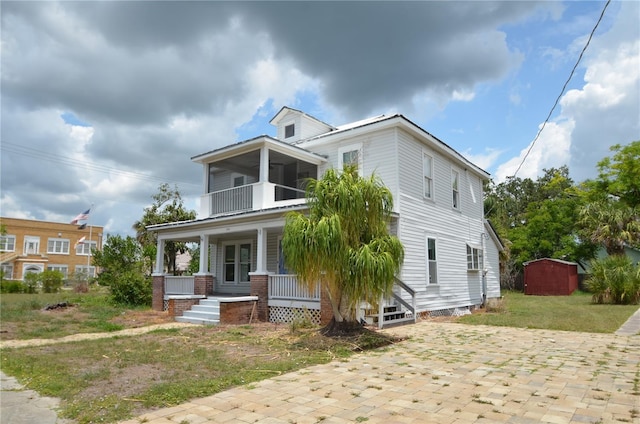 214 W Whidden St, Arcadia, FL 34266 - view of front of property featuring a balcony and a porch