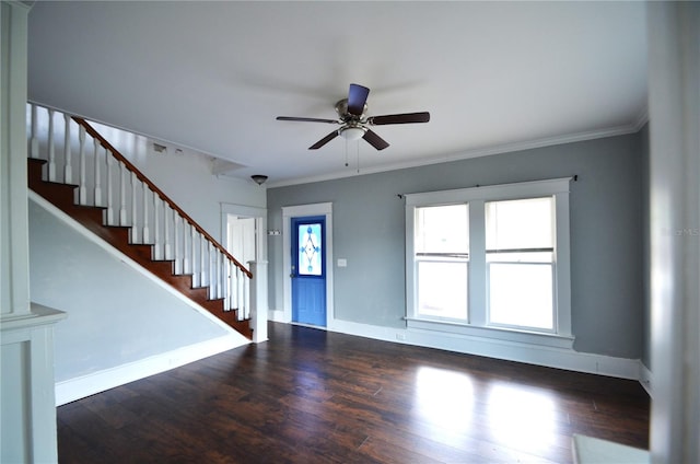 214 W Whidden St, Arcadia, FL 34266 - entrance foyer featuring stairway, wood finished floors, baseboards, and ornamental molding