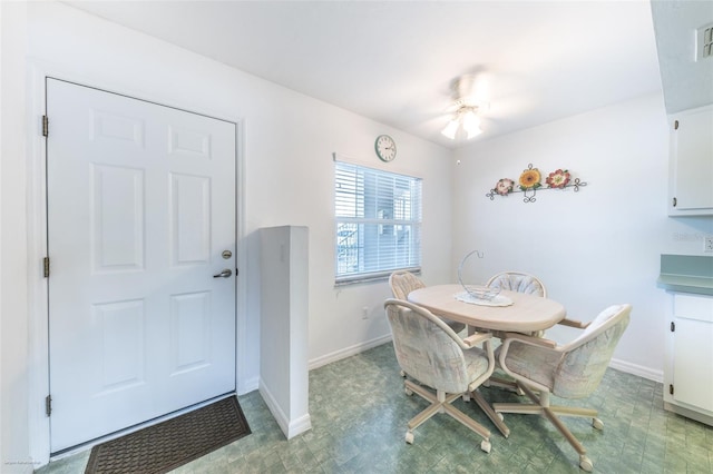dining area featuring baseboards and visible vents