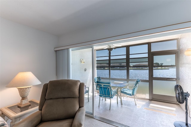 living area with a water view