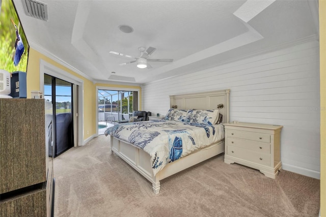474 Lomond Dr, Port Charlotte, FL 33953 - bedroom with a raised ceiling, access to outside, light carpet, baseboards, and crown molding