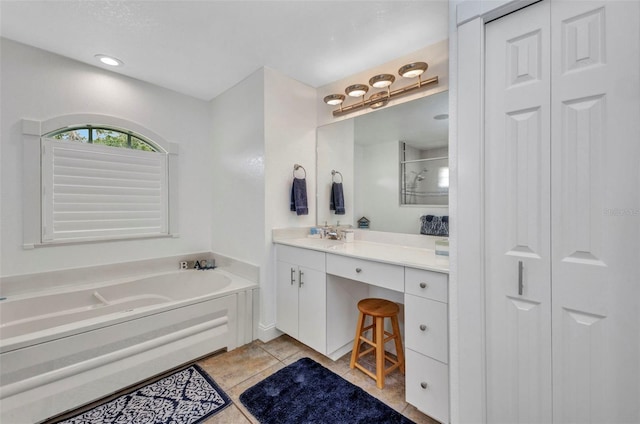474 Lomond Dr, Port Charlotte, FL 33953 - full bath with a closet, a bath, vanity, and tile patterned floors
