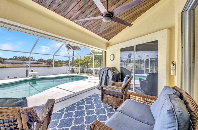 474 Lomond Dr, Port Charlotte, FL 33953 - view of pool featuring a patio area, ceiling fan, a lanai, and a water view