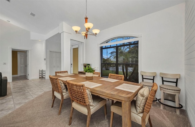 474 Lomond Dr, Port Charlotte, FL 33953 - dining area featuring a chandelier, a high ceiling, and a water view