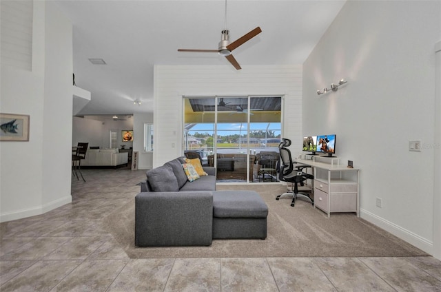 474 Lomond Dr, Port Charlotte, FL 33953 - tiled living room with an office area, a ceiling fan, and baseboards
