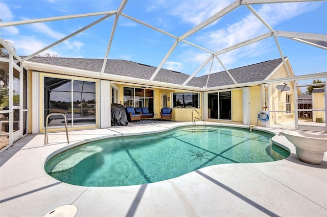 474 Lomond Dr, Port Charlotte, FL 33953 - swimming pool featuring a patio area, an outdoor hangout area, and glass enclosure