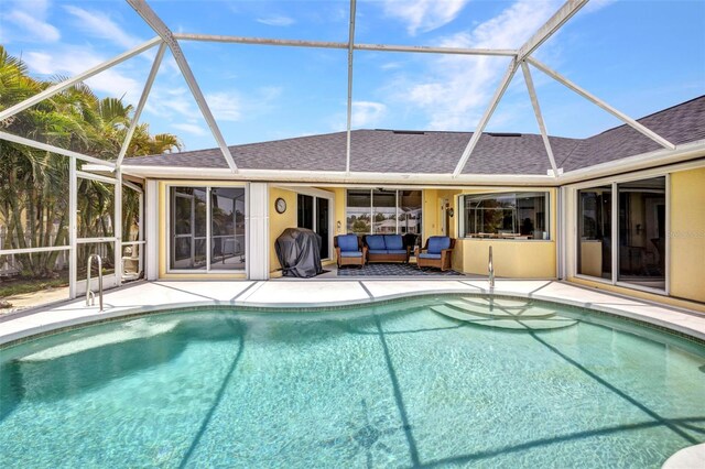 474 Lomond Dr, Port Charlotte, FL 33953 - outdoor pool with an outdoor hangout area, a patio area, and glass enclosure