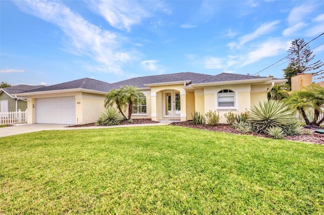 474 Lomond Dr, Port Charlotte, FL 33953 - view of front of property with french doors, stucco siding, a garage, and driveway