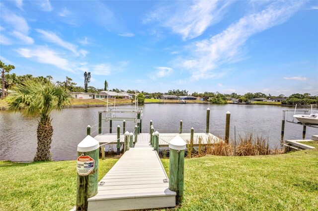 474 Lomond Dr, Port Charlotte, FL 33953 - dock area with a yard, a water view, and boat lift