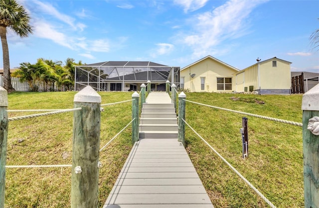 474 Lomond Dr, Port Charlotte, FL 33953 - back of house with a lanai and a lawn