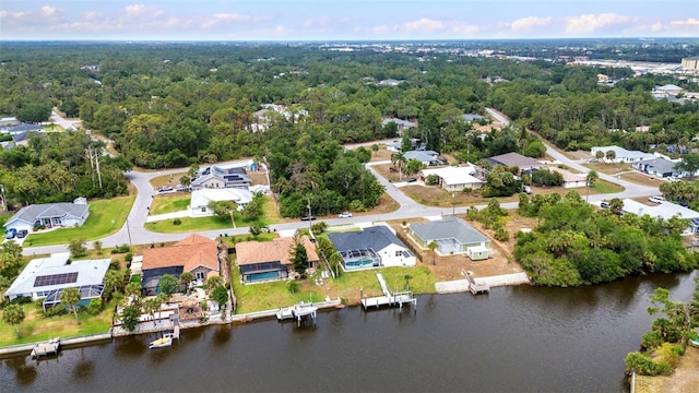 474 Lomond Dr, Port Charlotte, FL 33953 - aerial view of property and surrounding area featuring nearby suburban area and a large body of water