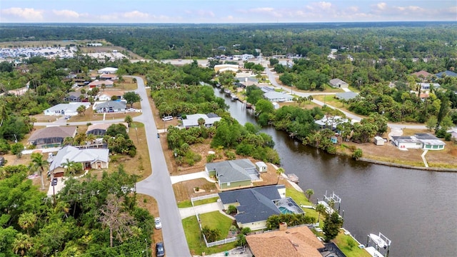 474 Lomond Dr, Port Charlotte, FL 33953 - aerial view of residential area with a large body of water and a forest