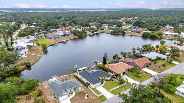 474 Lomond Dr, Port Charlotte, FL 33953 - aerial view of residential area with a large body of water