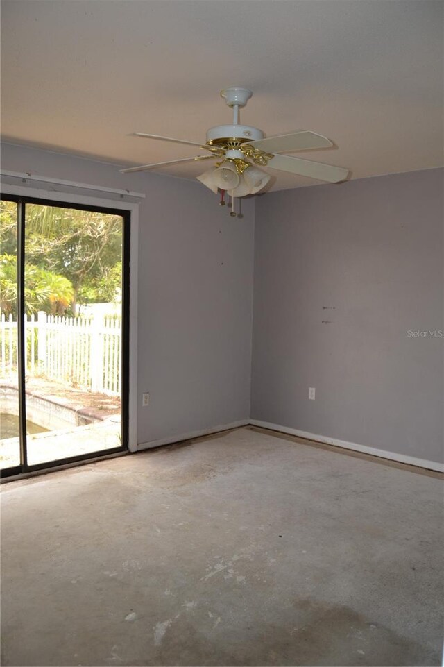 21161 Knollwood Ave, Port Charlotte, FL 33952 - spare room with concrete floors and ceiling fan